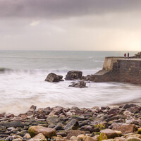 Buy canvas prints of Harmony Amidst the Tempest: Lamorna Cove by Andy Durnin