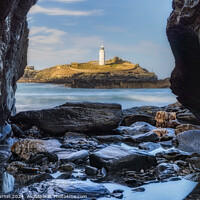 Buy canvas prints of Godrevy Lighthouse: Framed by Nature's Embrace by Andy Durnin