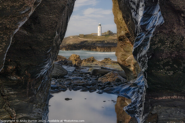Godrevy's Glimpse: Lighthouse Beyond the Rocky Portal Picture Board by Andy Durnin