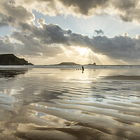 Buy canvas prints of Sunbeams over Rhossili Bay by Robert Canis