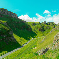 Buy canvas prints of A close up of a lush green hillside with Winnats Pass in the background by Tom Hartfil-Allgood