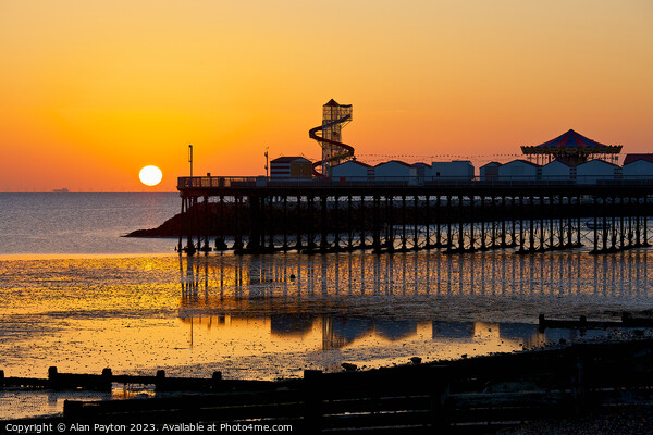 Sunrise and reflections at Herne Bay Pier Picture Board by Alan Payton