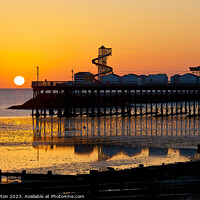 Buy canvas prints of Sunrise and reflections at Herne Bay Pier by Alan Payton