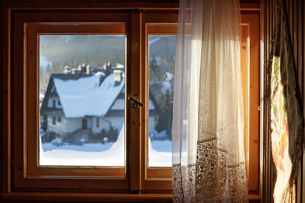 Beautiful view from window on winter village with  Picture Board by Olga Peddi