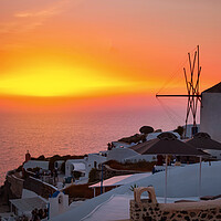 Buy canvas prints of Sunset over romantic Santorini - Image by Olga Peddi