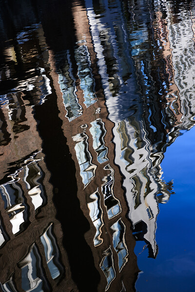 Colourful reflection of a city in a water. Amsterd Picture Board by Olga Peddi