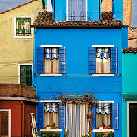 Buy canvas prints of Beautiful colorful houses of Burano, Venice, Italy by Olga Peddi