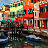 Buy canvas prints of Colorful houses and canal on Burano island, near V by Olga Peddi