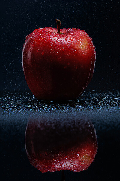 Red apple with water drops Picture Board by Olga Peddi