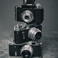 Buy canvas prints of Set of Vintage Film Cameras. by Olga Peddi