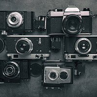 Buy canvas prints of Set of Vintage Film Cameras. by Olga Peddi