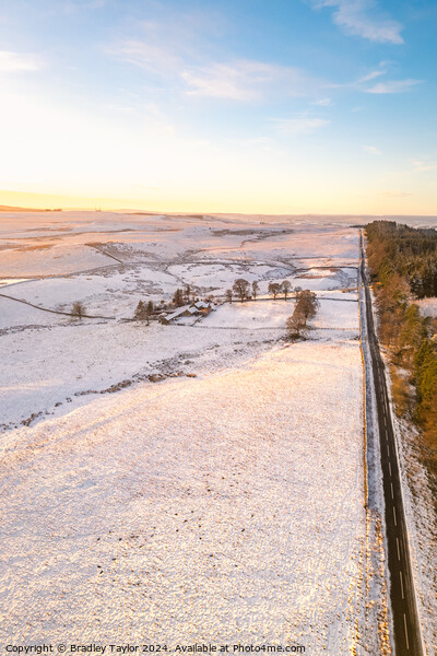 Long Snowy Road, Northumberland Picture Board by Bradley Taylor