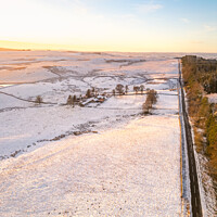 Buy canvas prints of Long Snowy Road, Northumberland by Bradley Taylor
