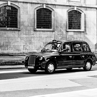 Buy canvas prints of Iconic Black London Taxi in Black and White by Bradley Taylor