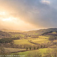 Buy canvas prints of Welsh Countryside - Sun Breaking Through Clouds by Bradley Taylor