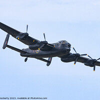 Buy canvas prints of Lancaster Bomber by Adrian Dockerty