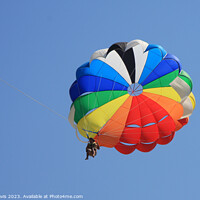 Buy canvas prints of Parachute on a clear blue sky by Tony Davis