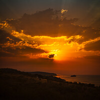 Buy canvas prints of Sunrise behind the clouds by Costas Kalamaras