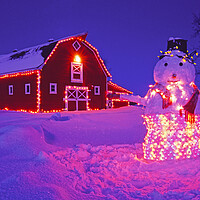 Buy canvas prints of snowman in Front of Red barn by Dave Reede