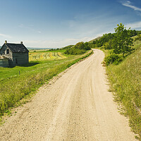 Buy canvas prints of country backroad  though hills by Dave Reede