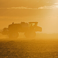 Buy canvas prints of a high clearance sprayer applies liquid fertilizer by Dave Reede