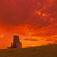 Buy canvas prints of abandoned grain elevator and cumulonimbus cloud mass by Dave Reede