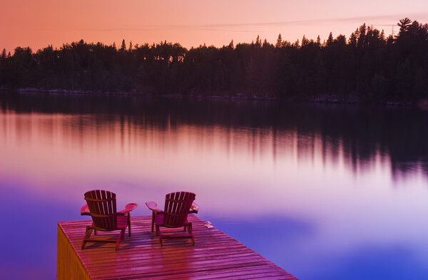 Muskoka chairs on dock Picture Board by Dave Reede