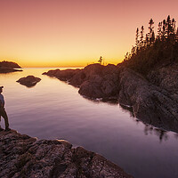 Buy canvas prints of hiker along shoreline by Dave Reede