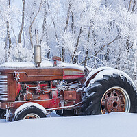 Buy canvas prints of Old Tractor in the Snow by Dave Reede