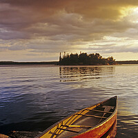 Buy canvas prints of canoe on Nutimik Lake by Dave Reede