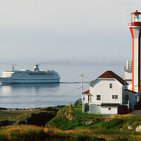 Buy canvas prints of Ship passing Lighthouse by Dave Reede