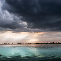 Buy canvas prints of Turquoise lake under the cloudy sky by Dejan Travica