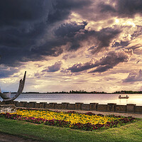 Buy canvas prints of The sculpture Wings on the Palic lake under the cloudy sky by Dejan Travica