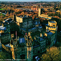 Buy canvas prints of Aerial view of the Lancaster castle surrounded by lush greenery in a quaint town during sunset. by Man And Life