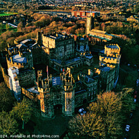 Buy canvas prints of Aerial view of the Lancaster castle surrounded by greenery at sunset, showcasing the architecture and landscape. by Man And Life
