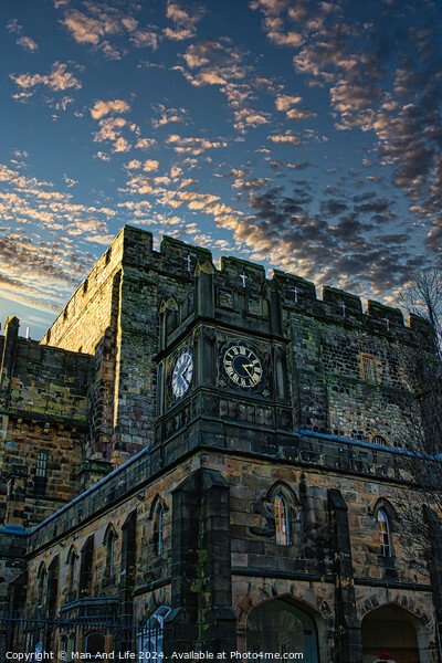 Historic stone clock tower against a dramatic sky at dusk in Lancaster. Picture Board by Man And Life