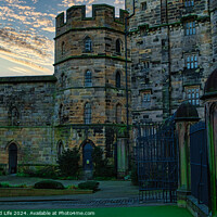 Buy canvas prints of Historic stone castle at dusk with dramatic sky and greenery, suitable for travel and history themes in Lancaster. by Man And Life