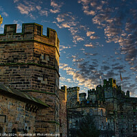 Buy canvas prints of Medieval castle at dusk with dramatic sky and clouds in Lancaster. by Man And Life