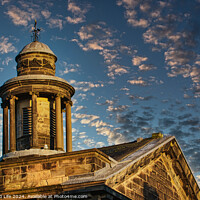Buy canvas prints of Historic stone building with a dome under a blue sky with scattered clouds at sunset in Lancaster. by Man And Life