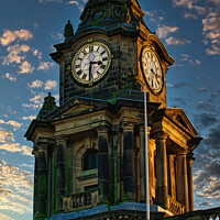 Buy canvas prints of Historic clock tower against a dramatic sky at dusk, showcasing intricate architecture and timeless design in Lancaster. by Man And Life