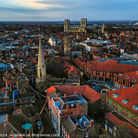 Buy canvas prints of Aerial view of a historic city at dusk with prominent cathedral and urban landscape in York, North Yorkshire by Man And Life