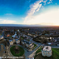 Buy canvas prints of Panoramic aerial view of a city at sunset with dramatic sky and urban landscape in York, North Yorkshire by Man And Life