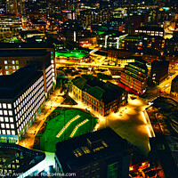 Buy canvas prints of Aerial night view of a vibrant cityscape with illuminated streets and buildings in Leeds, UK. by Man And Life