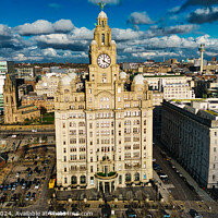 Buy canvas prints of Aerial view of a historic clock tower and surrounding buildings under a cloudy sky in Liverpool, UK. by Man And Life