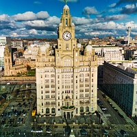 Buy canvas prints of Aerial view of the historic Royal Liver Building in Liverpool, UK, with dramatic clouds in the sky. by Man And Life