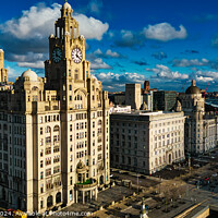 Buy canvas prints of Dramatic skyline with historic buildings under a cloudy blue sky in Liverpool, UK. by Man And Life