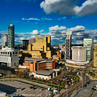 Buy canvas prints of Panoramic cityscape with modern skyscrapers under a blue sky with fluffy clouds in Liverpool, UK. by Man And Life