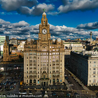 Buy canvas prints of Aerial view of a cityscape with historic buildings under a cloudy sky in Liverpool, UK. by Man And Life