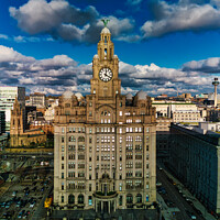 Buy canvas prints of Dramatic sky over historic clock tower building in urban landscape in Liverpool, UK. by Man And Life