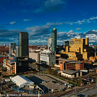 Buy canvas prints of Dramatic cityscape with modern skyscrapers under a dynamic sky in Liverpool, UK. by Man And Life